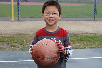 Liam plays basketball