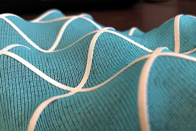 4-D Textiles, printed grids on standard textile. The APPLIED SOLID MECHANICS LAB is Applying solid mechanics principles to various applications such as wind energy, composite manufacturing, flexible electronics, and textile manufacturing to improve performance, predictions, and design.
