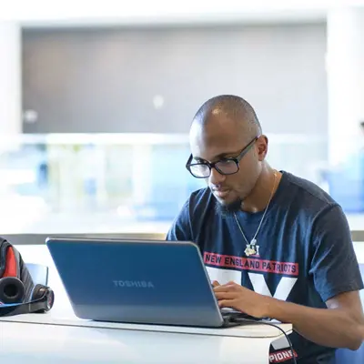 Student working on a laptop