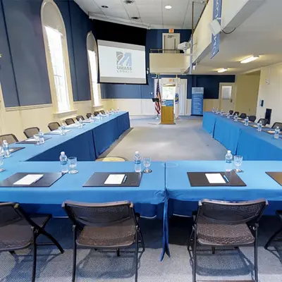 Alumni Hall with Table setup in Horseshoe Layout