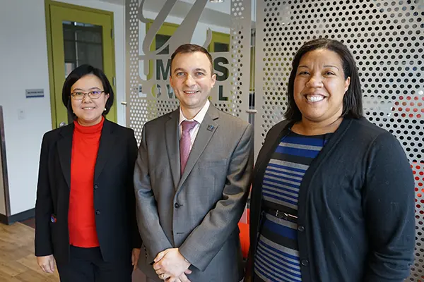 Business faculty members Nichalin Summerfield, Asil Oztekin and Karoline Evans