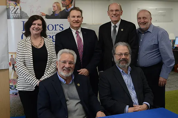 Clockwise from back row left: UML Vice Provost for Student Success Julie Nash, UML Provost Michael Vayda, MCC President James Mabry, UML Honors College Dean Jim Canning, MCC Honors Program Director and History Prof. David Kalivas, and MCC Provost Philip Sisson