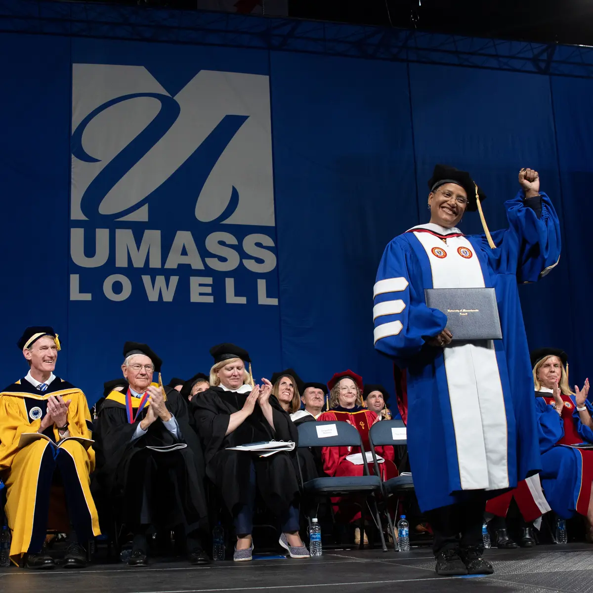 Sian Proctor accepts an Honorary Degree from UMass Lowell before she speaks at Commencement