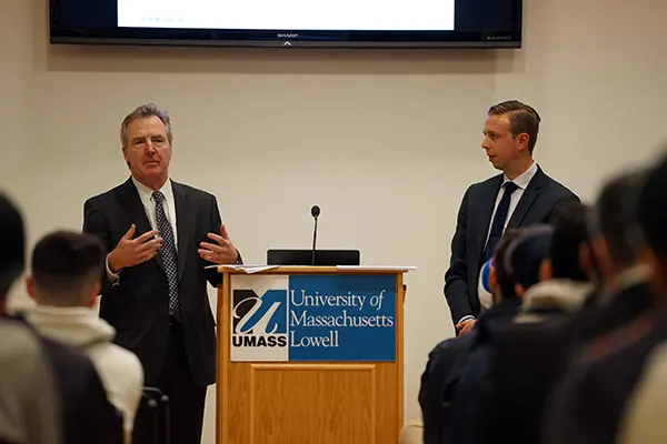 Bill Cox and Ethan Brown talk to business students at ETIC