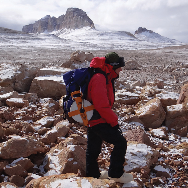 Woman hiking in Antarctica