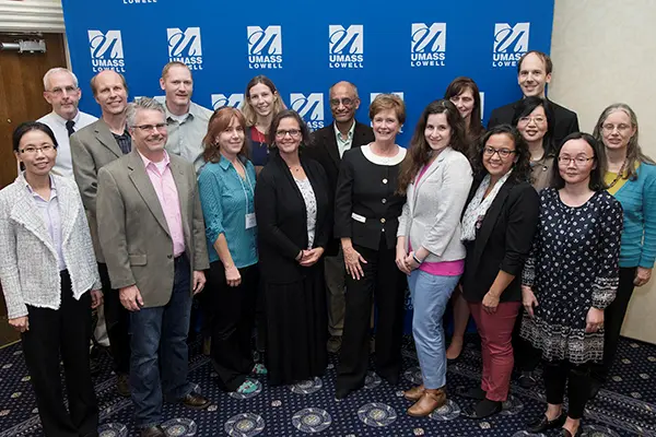 Chancellor Jacquie Moloney and faculty members at the Faculty Symposium