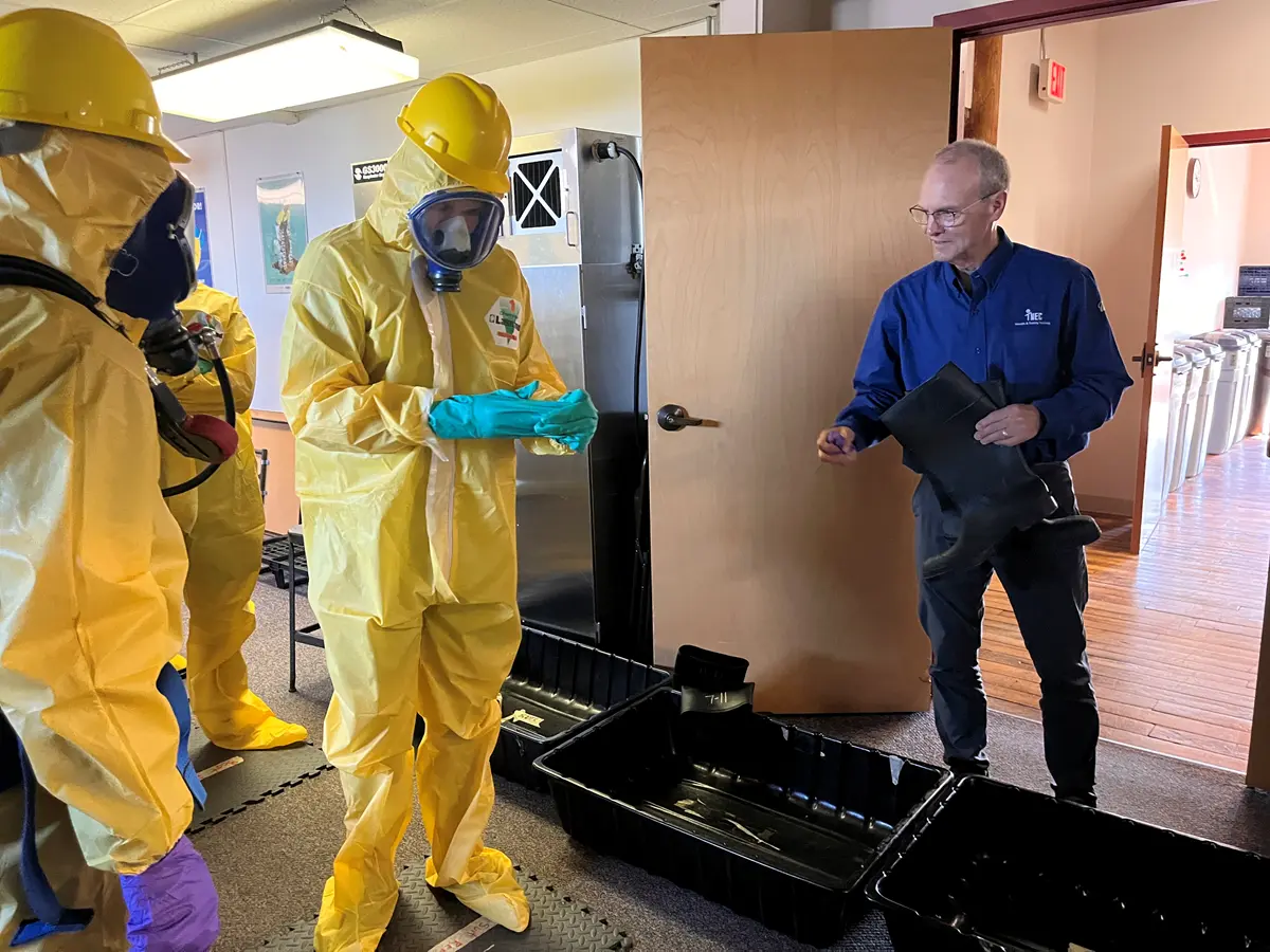 Tom Estabrook advises students in the hazmat class