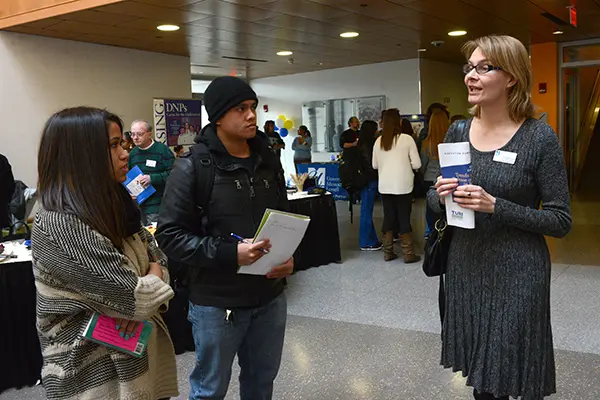 UMass Lowell Public Health Research Prof. Pia Markkanen talks to prospective students