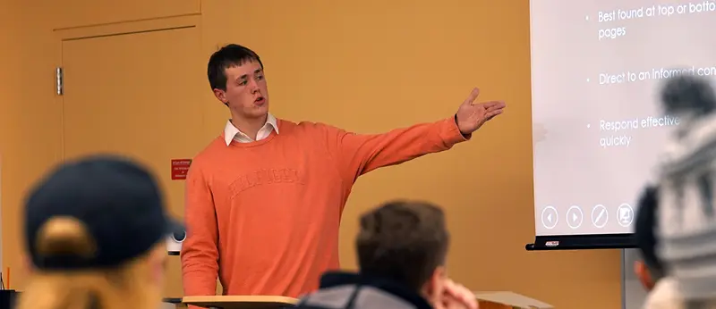 UMass Lowell student Kelly Skelton presents to a class