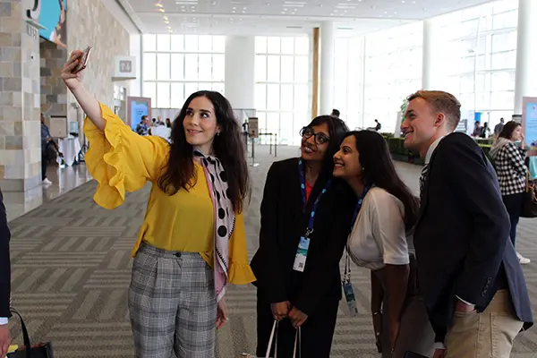 Diana Smith takes a selfie with fellow MSB students