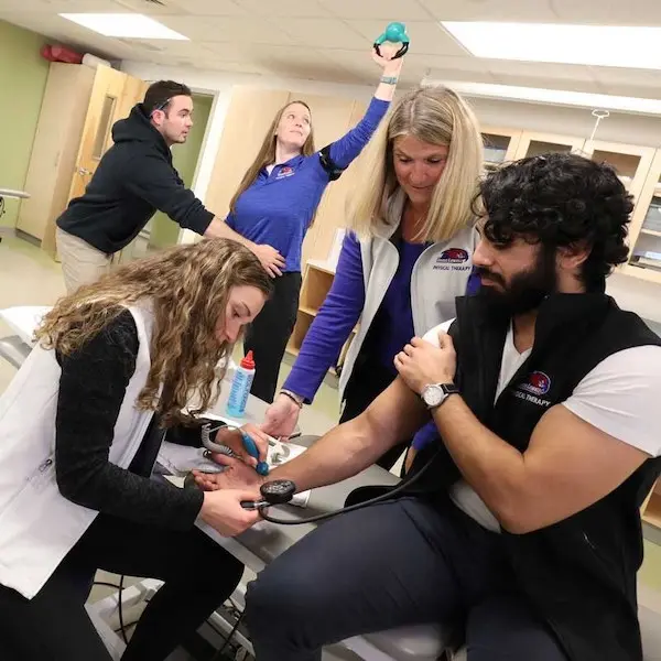 Michele Fox in PT Lab with students