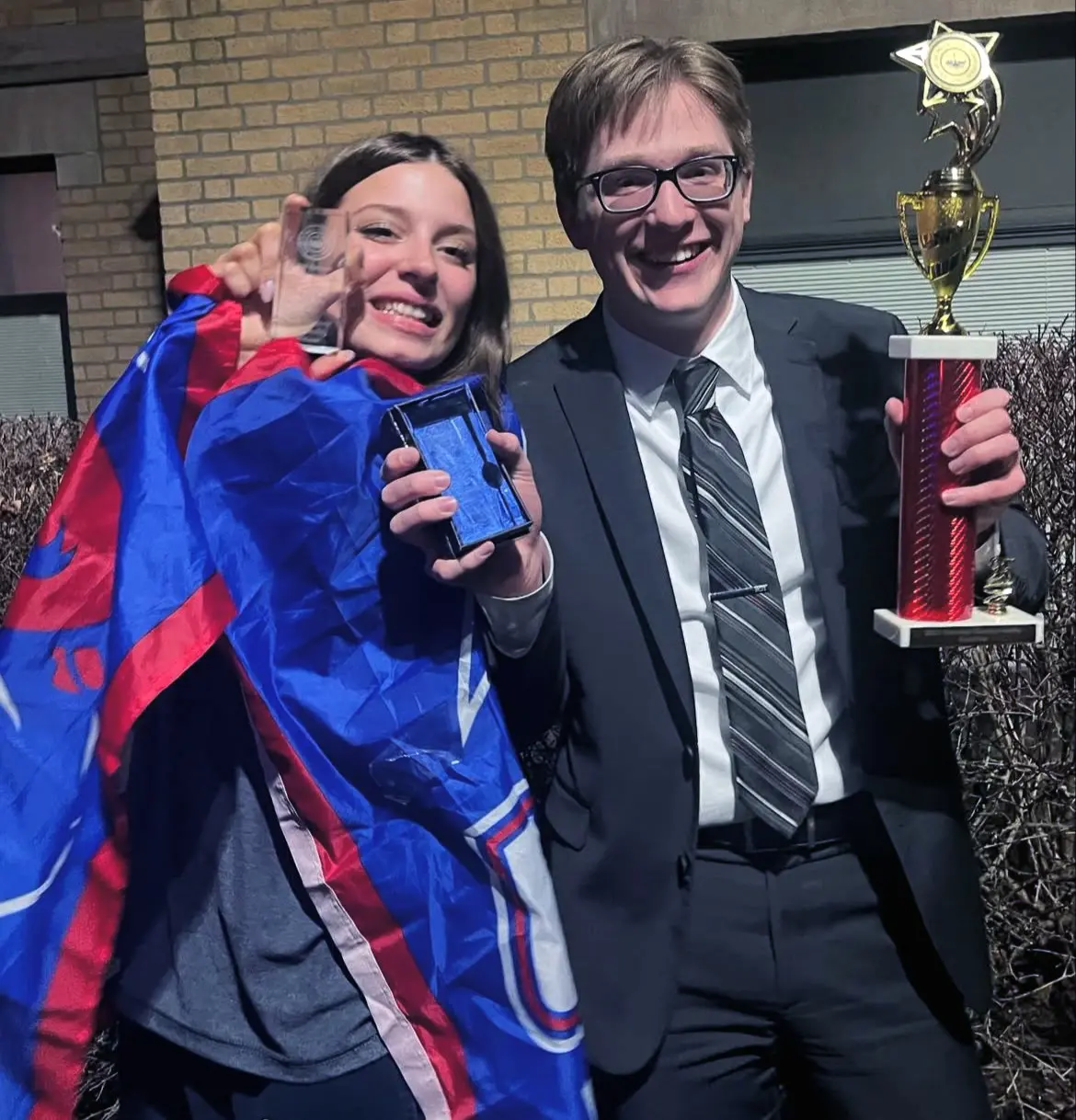 Mock Trial members Rena McFall and Declan Reidy pose with their individual awards.