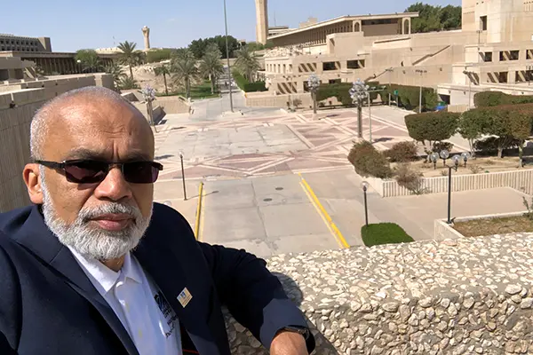 Luvai Motiwalla poses for a photo at the KFUPM campus