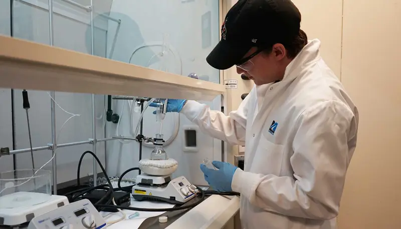 Student working in a UMass Lowell laboratory