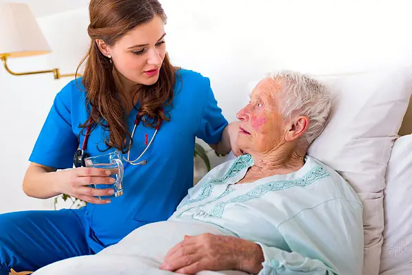 Nurse with a hospital patient