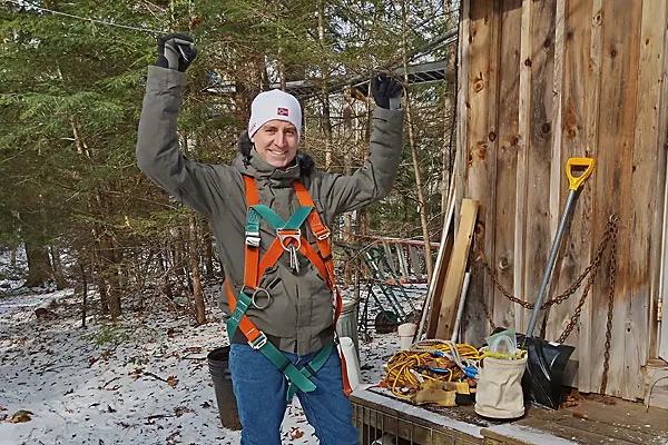 Obrist-dons-safety-harness