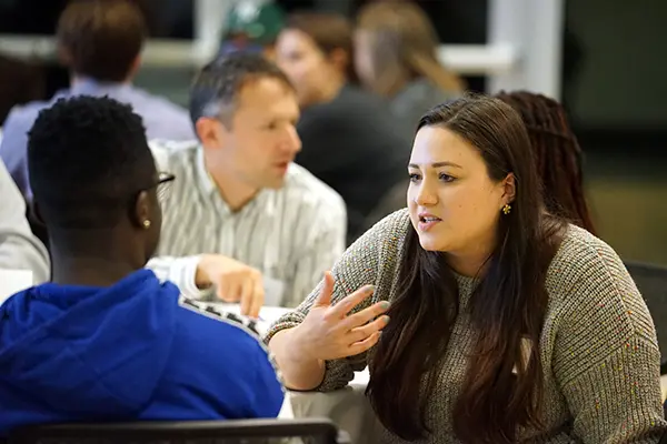 Ashley Austin talks with her mentee Deion Lightfoot-Taylor