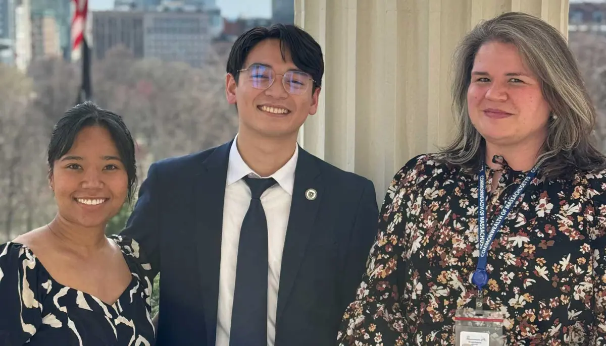 Sabine Laurent poses with two other people.
