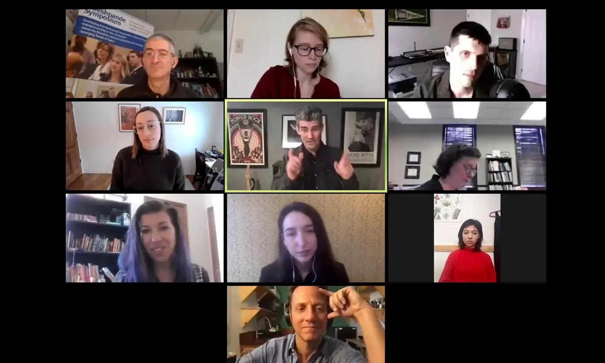 Greg Harris (center), president and CEO of the Rock and Roll Hall of Fame, discusses the relationship between music and entrepreneurship during a recent Zoom call that included UMass Lowell's Thomas O'Donnell (top left), Savanah Marshall (bottom left) and Alan Williams (bottom center).