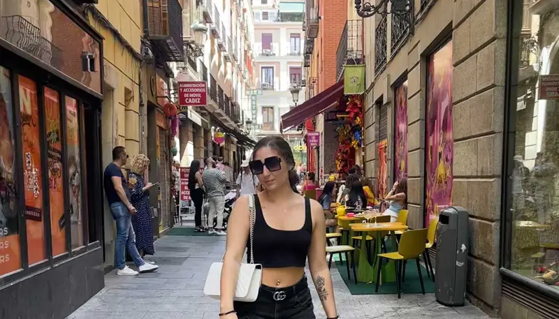 Stephanie Guglielmo poses on a street in Puerto del Sol