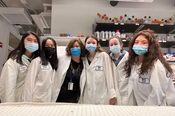 Prof. Shannon Kelleher with students