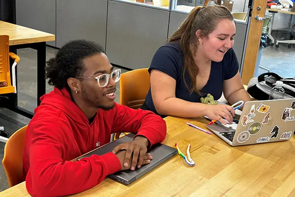 Students Sneyker Medrano and Stephanie Orr at the Lawrence Lin Makerspace.