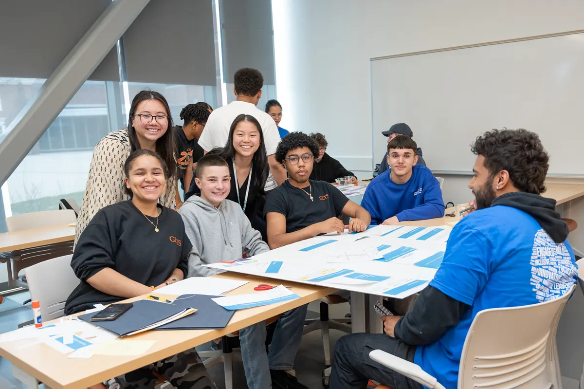 Tanya Kieu and Ariel Grill with students