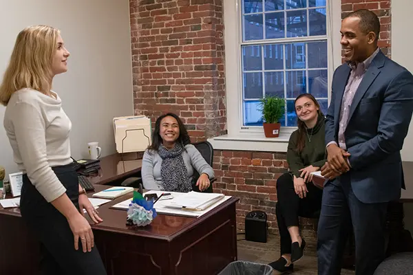UMass Lowell alumni in Congresswoman Lori Trahan's district office in Lowell