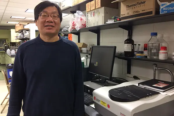 Chemistry Prof. Yuyu Sun in his laboratory