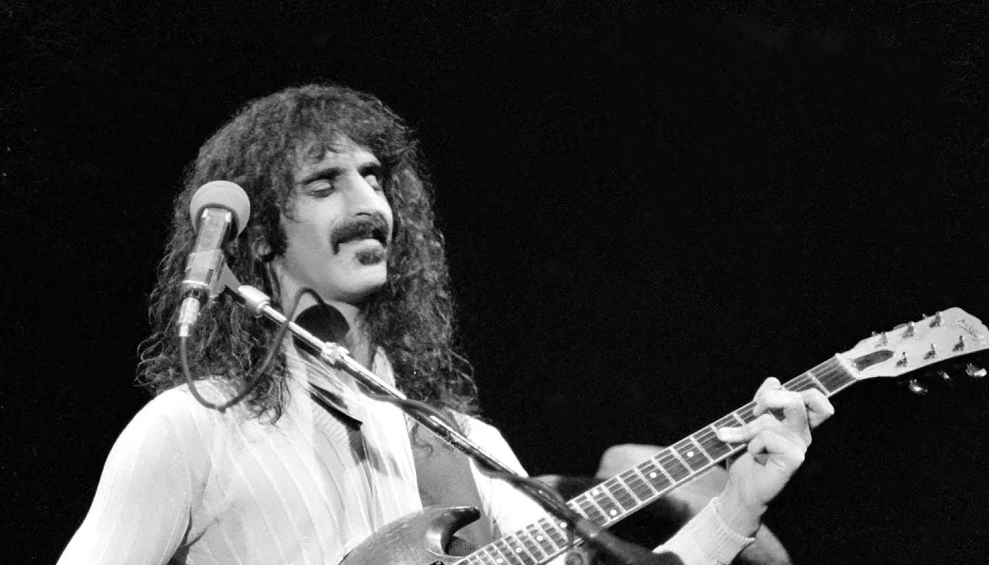 Frank Zappa playing guitar