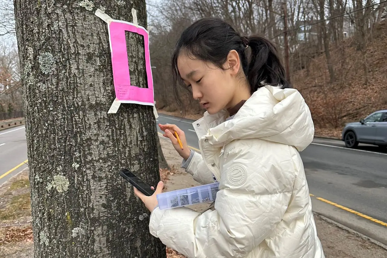 Zhang collecting samples