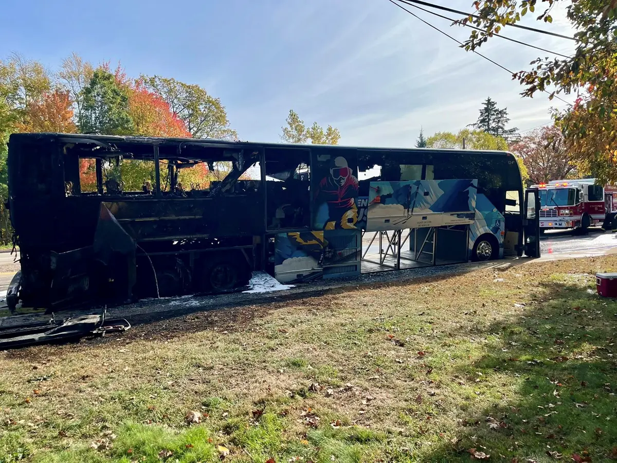The burned out remains of a charter bus.