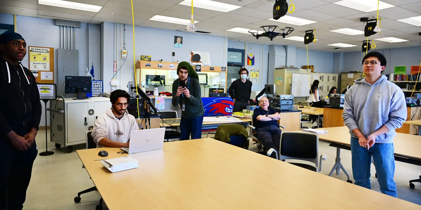 Students and faculty members in the Makerspace.