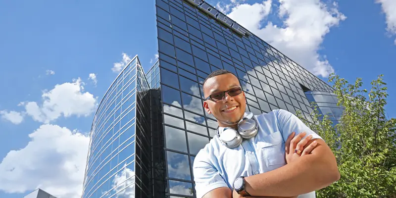 Professional co-op student Jack Goutier stands outside of Bose global headquarters in Framingham, Mass.