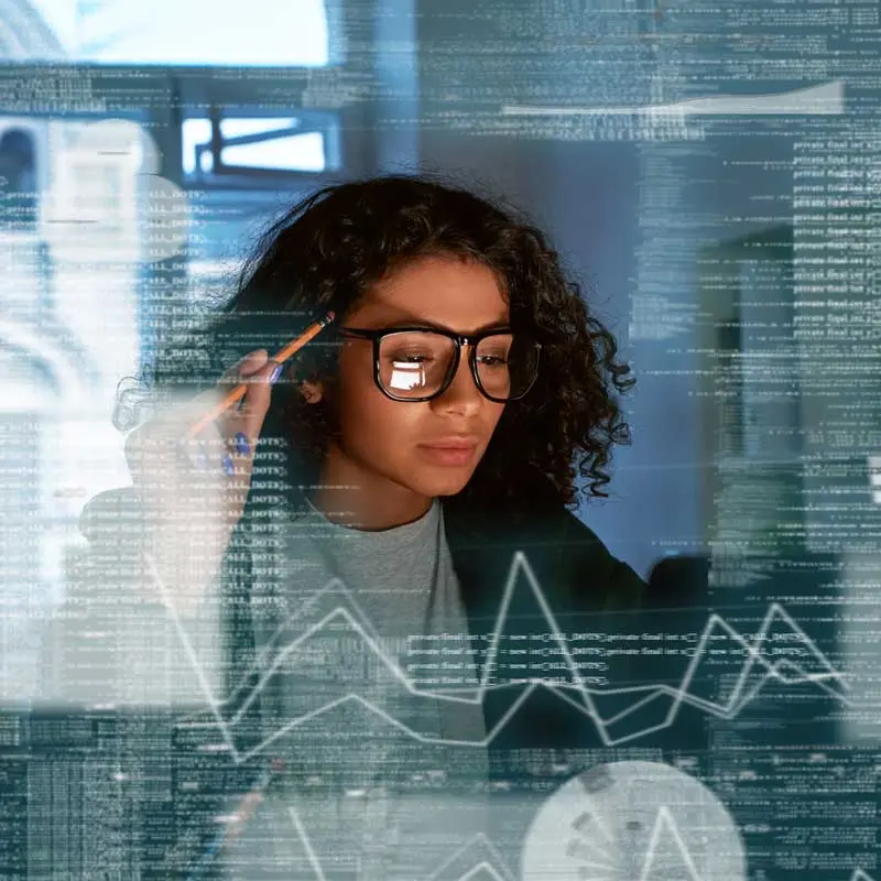 Student holding a pencil with data and graph images overlay