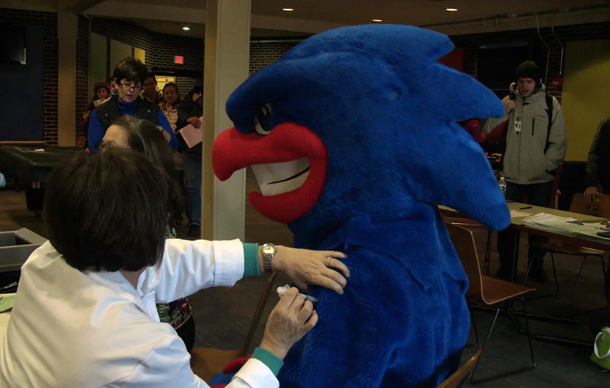 Rowdy getting a flu shot.