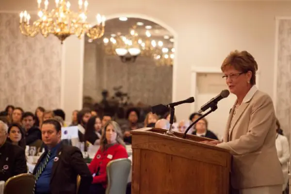 UMass Lowell Chancellor Jacquie Moloney speaks to the crowd at a breakfast
