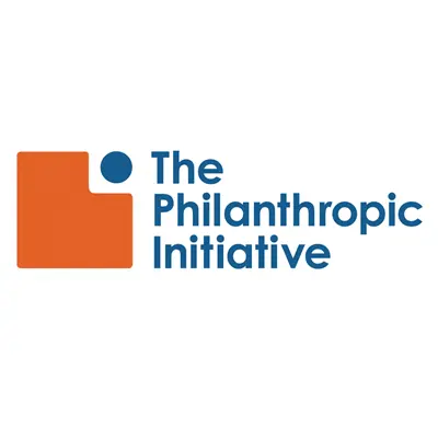 The Philanthropic Initiative logo - those words with an orange and blue geometric design to the left of the words.
