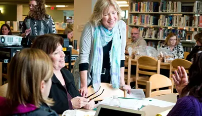women collaborating around a table