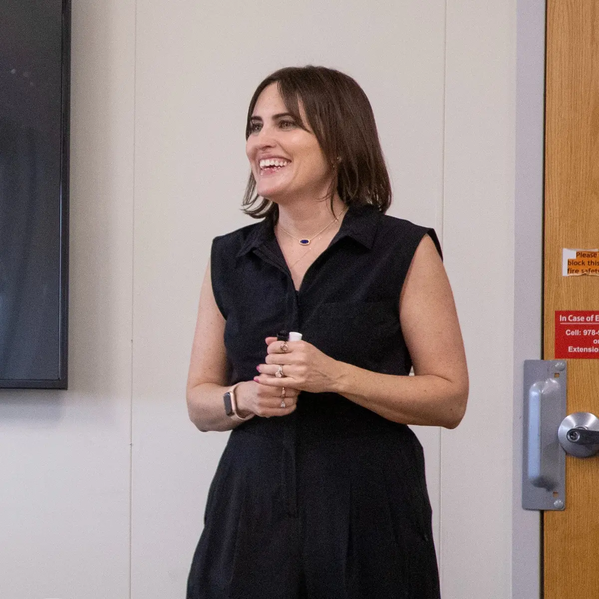 A professor speaks in a UMass Lowell classroom.